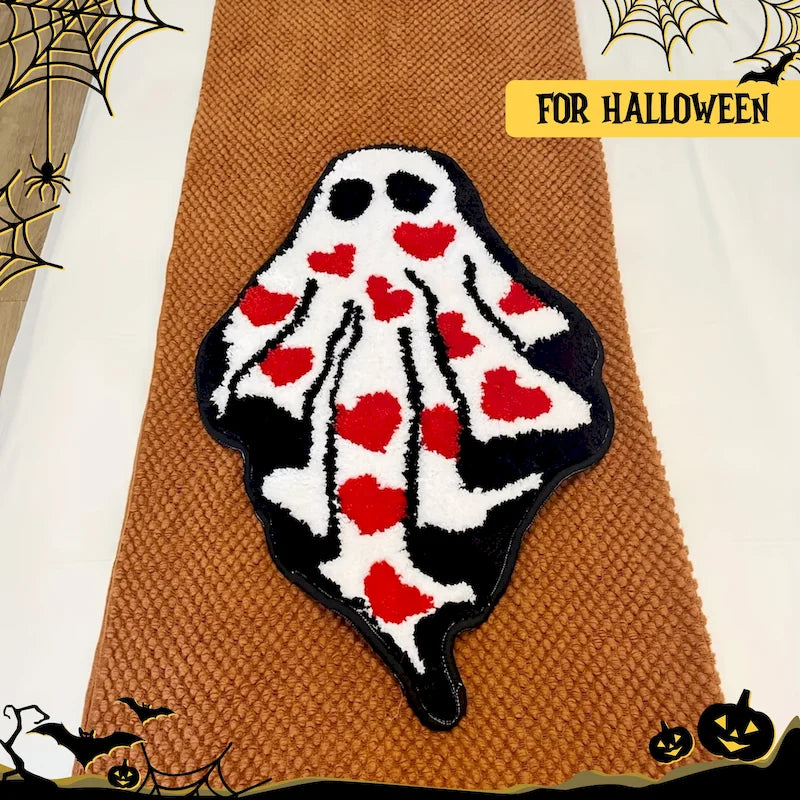 Ghost Heart Tufted Rug — "Lovestruck Ghost"
A whimsical ghost-shaped tufted rug covered in scattered red hearts, blending spooky-cute charm with a playful pop of color. The plush, textured pile gives it a cozy handcrafted-l